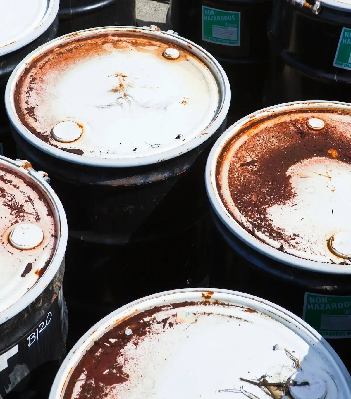 weathered-metal-waste-barrels-rusty-and-decaying-2025-04-04-19-23-17-utc-1
